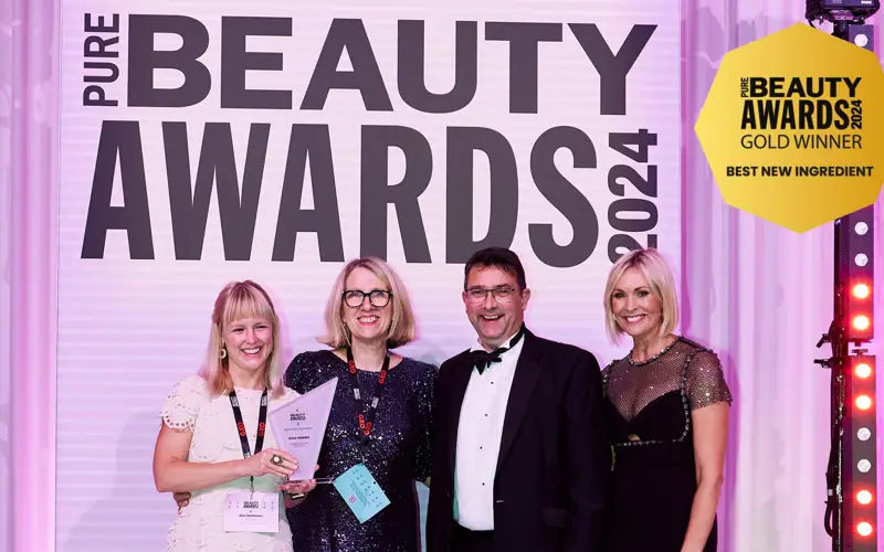 people receiving award at ceremony